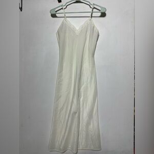 Elegant Lace-Trimmed Cream Slip by [Brand]